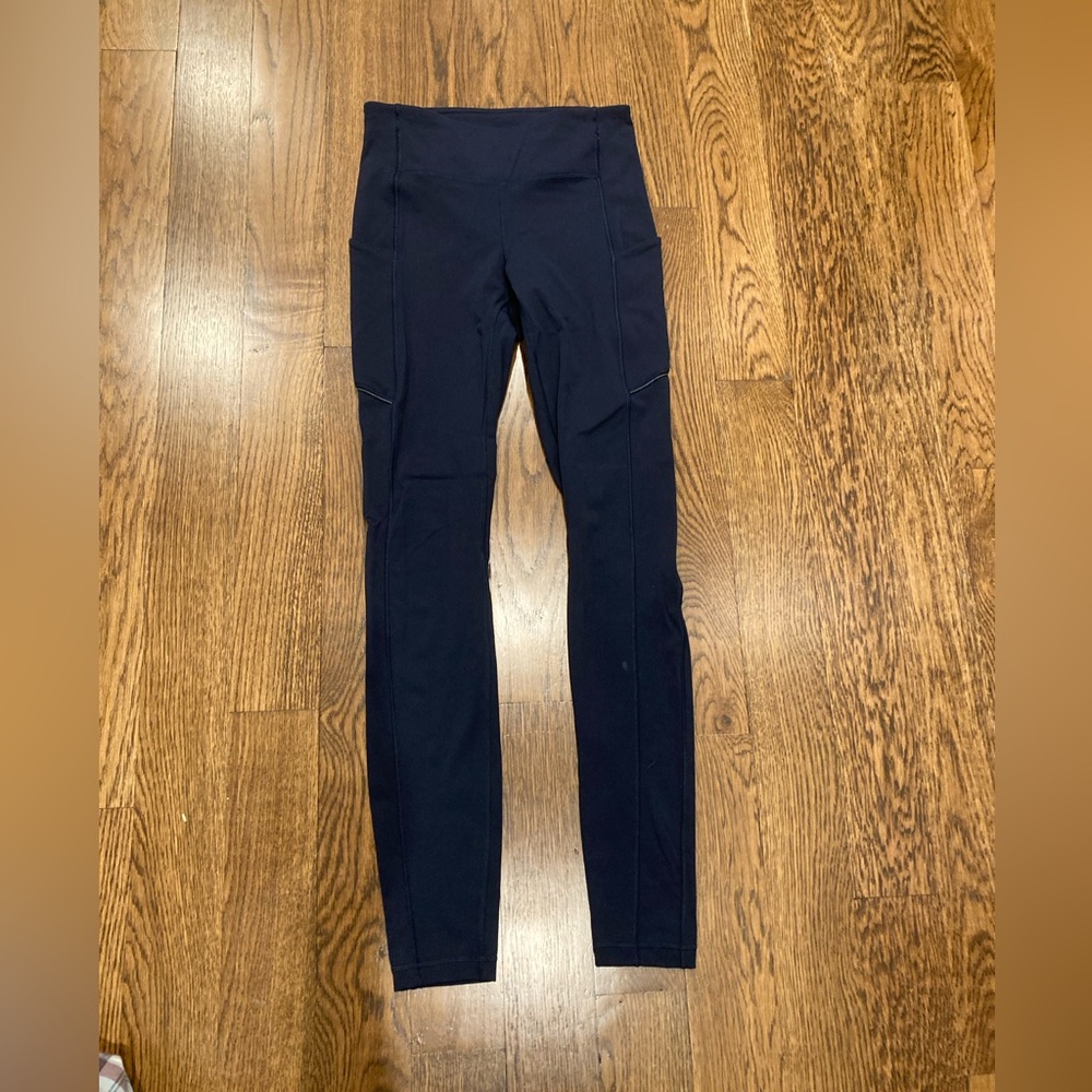 Lululemon navy blue wunder train with pockets size 4